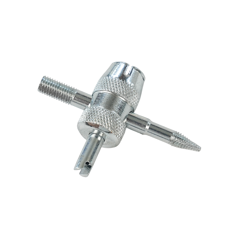 Outil de valve de pneu à quatre voies